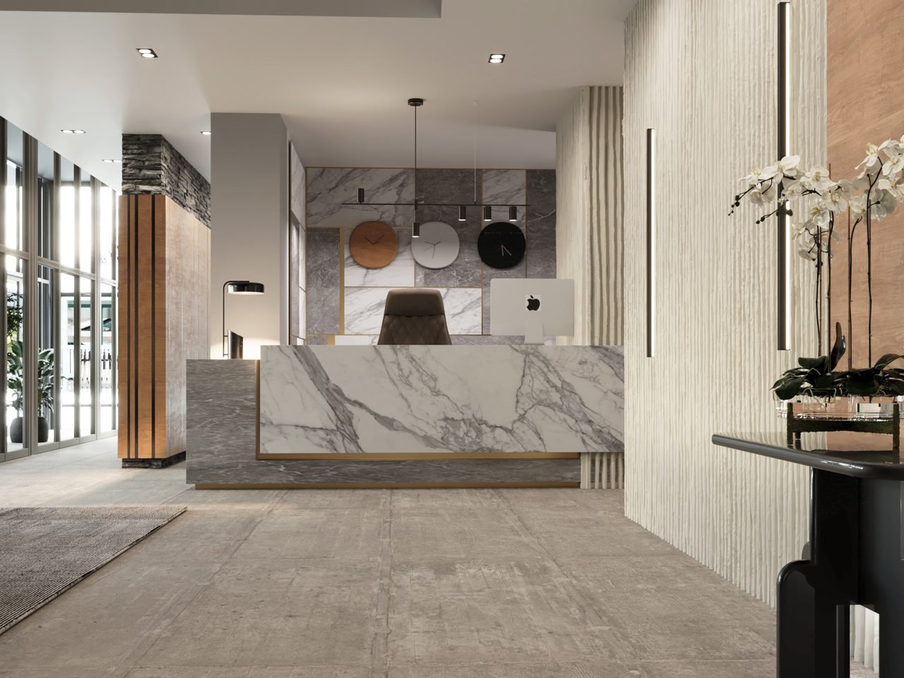 Marble reception desk with brass reveal and warm oak panelling