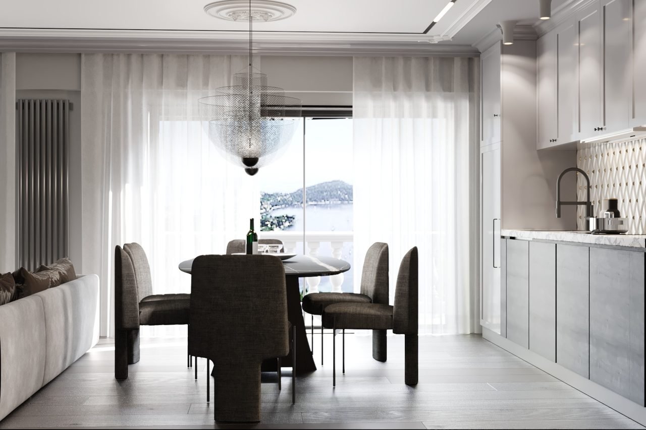 Dining area with marble table and mesh chandelier by a sea-view window